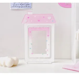 Detail of pink roof house acrylic photo frame with heart and star patterns