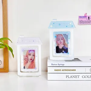 Minimalist house-shaped acrylic photo card holder with rotating stars and stable base