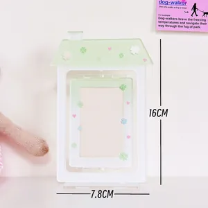 Minimalist house-shaped acrylic photo frame stand in white and green with clover motifs