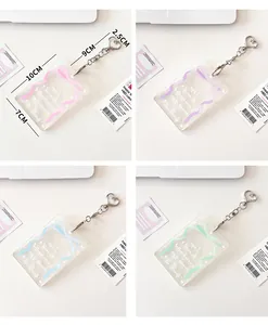 Detailed view of colorful ribbon patterns on acrylic card holders with heart clasps