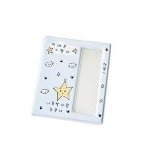 Light blue cartoon photocard album with yellow stars and cat motifs for collectors