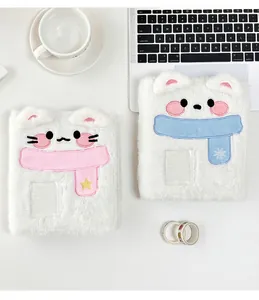 Detail of plush animal photocard binders with soft white fur and cute facial embroidery