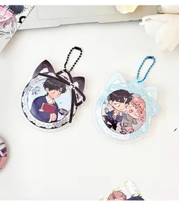 Macro detail of acrylic cat ear badge holder with cute anime character illustration