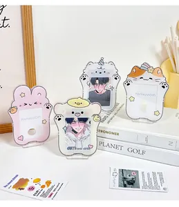 Detail of cute animal acrylic photo card holders with rabbit and bear desktop stands