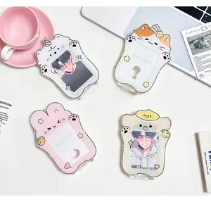 Flat lay of four cute acrylic animal-themed toploader card holders in macaron colors