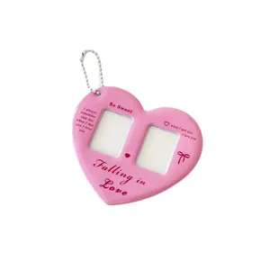 Pink heart-shaped double photo frame keychain with bead chain and romantic lettering