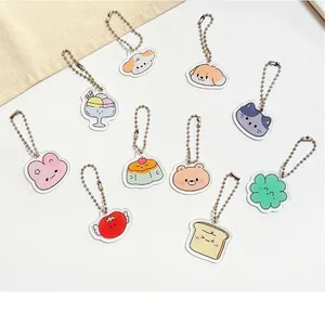 Collection de dix porte-clés mignons en acrylique avec divers motifs d'animaux et d'aliments