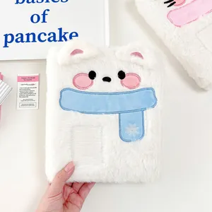 Cute white plush puppy photocard binder with blue scarf and transparent card slot