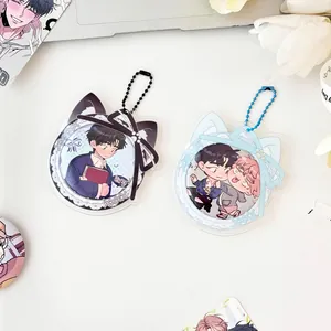 Acrylic cat ear badge holder with lace border and blue ribbon for anime pins