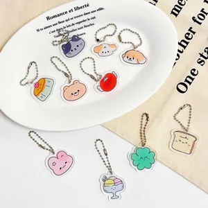 Lot de 10 pendentifs de dessin animé en acrylique avec chaînes argentées et illustrations variées
