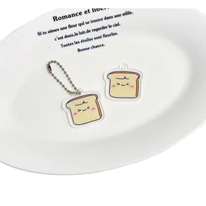 Porte-clés toast mignon en acrylique avec visage souriant et chaîne métallique
