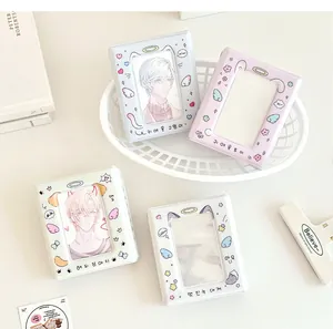 Detailed view of four colorful mini photo albums with cute animal themes and transparent windows