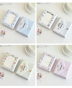 Detail of multi-color card holders featuring angel pets and clear windows for photos