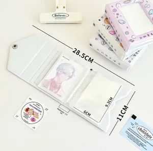 Detail showing dimensions and interior sleeves of white leather photo card album