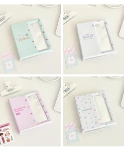 Detail of four colorful mini photo albums with cute cartoon windows and PU leather texture