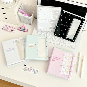 Detail of 3-inch photo card albums with cute strawberry and angel designs for collectors