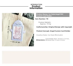 Light blue angel wing PVC photocard holder with bead chain shown on canvas bag