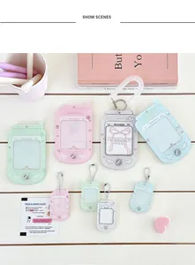 Detail view of colorful mobile phone shaped acrylic card holders in four pastel colors