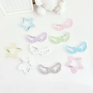 Colgantes de acrílico con brillo de estrellas y alas en colores pastel para bolsos