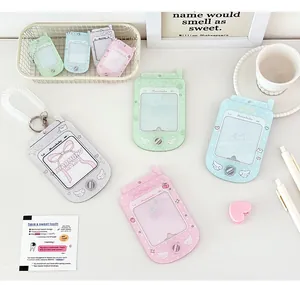 Macro detail of retro phone style acrylic card holders in soft pastel macaroon colors