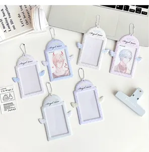 Detail view of angel wing photo card holders with bead chains and pastel colors