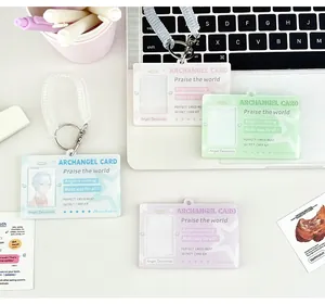 Macro view of pastel acrylic Archangel card holders with star wings and spring lanyards