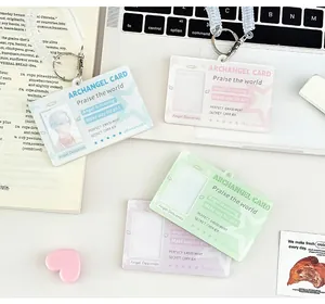 Detailed macro view of acrylic ID card holders with angel wings and spring lanyards