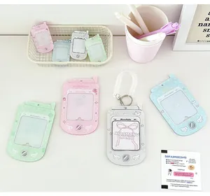 Detail of retro phone-shaped acrylic card holders in pastel colors with spring lanyards