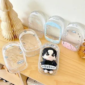 Detail view of clear PVC doll storage bags featuring cute Korean-style prints