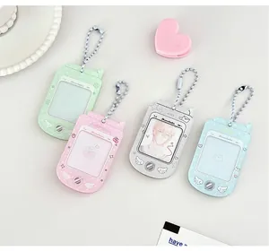 Retro flip phone style acrylic photo card holder keychain in four pastel colors