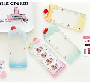 Detail of four colorful acrylic photo holders with cute 3D dessert toppings and gradients