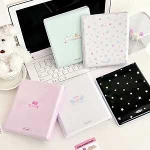 Collection of colorful A6 card binders with strawberry and angel wing illustrations