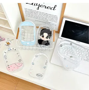 Close-up of a clear PVC zipper pouch with cute Korean-style illustrations and blue trim