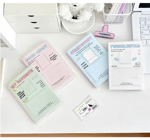Set of four pastel PVC planners with card slots on white desk, top view arrangement