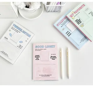 Macro view of pastel photocard binders with transparent pockets and decorative card inserts
