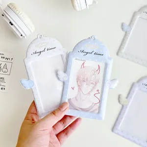 Blue and white angel wing photo card holders with star patterns and Angel Time text