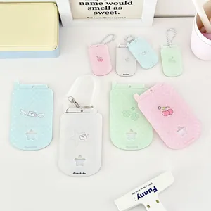 Pastel flip-phone shaped acrylic card holders with cherry and star patterns in four colors