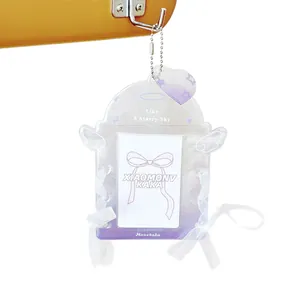 Glittery purple acrylic photocard holder with angel wings and white lace ribbon deco