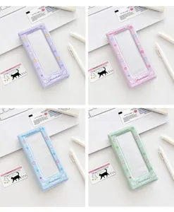 Detailed view of four colorful PVC photo card holders with angel wings and star motifs