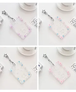 Detailed four-grid view of glittery acrylic star card holders with metal star keychains