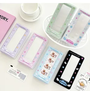 Macro detail of various pastel photo albums with transparent windows and star patterns