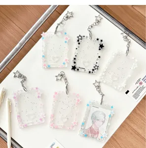 Detailed view of colorful glitter star acrylic card holders with star-shaped keychains