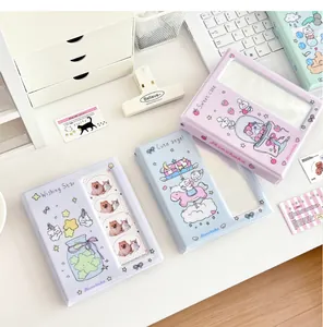 Detailed view of pastel macaron photocard binders with cute cartoon illustrations