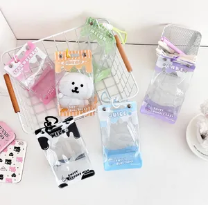 Detailed view of clear PVC storage bags with various dessert themes for plush toy display