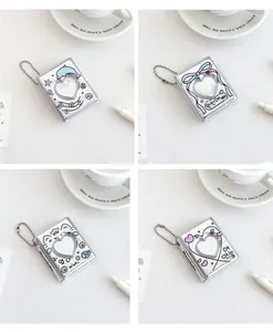 Mini photo album collection featuring silver heart window frames and cute animal designs