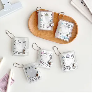 Macro view of PVC glitter mini photocard holder with heart cutout and metal snap closure
