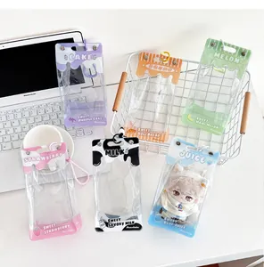Close-up of clear PVC doll carrier bags in various beverage and food theme designs