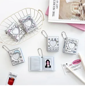 Detail of Korean mini photocard binder with heart cutout and silver glitter PVC edges
