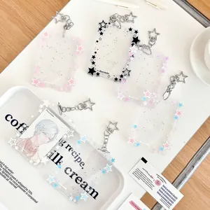 Glitter star acrylic photocard holders in multiple colors with star-shaped keychains