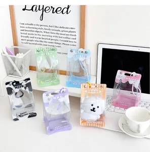 Detailed view of colorful milk carton style transparent PVC doll storage pouches